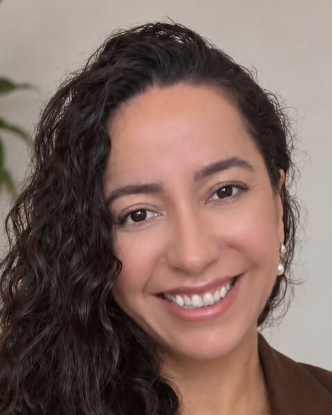 Dany Zumer, case manager, smiling at the camera.